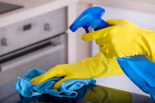 Local technician treating a stubborn stain in a Greenwich home