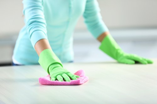 Cleaning shared lobby and touchpoints in a Greenwich building