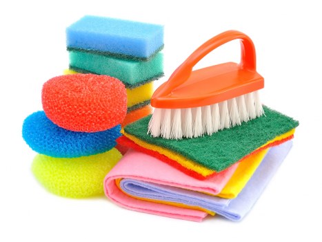 Professional cleaner maintaining a kitchen in Greenwich